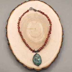 Vintage artisan sterling silver coral bead and turquoise pendant necklace.